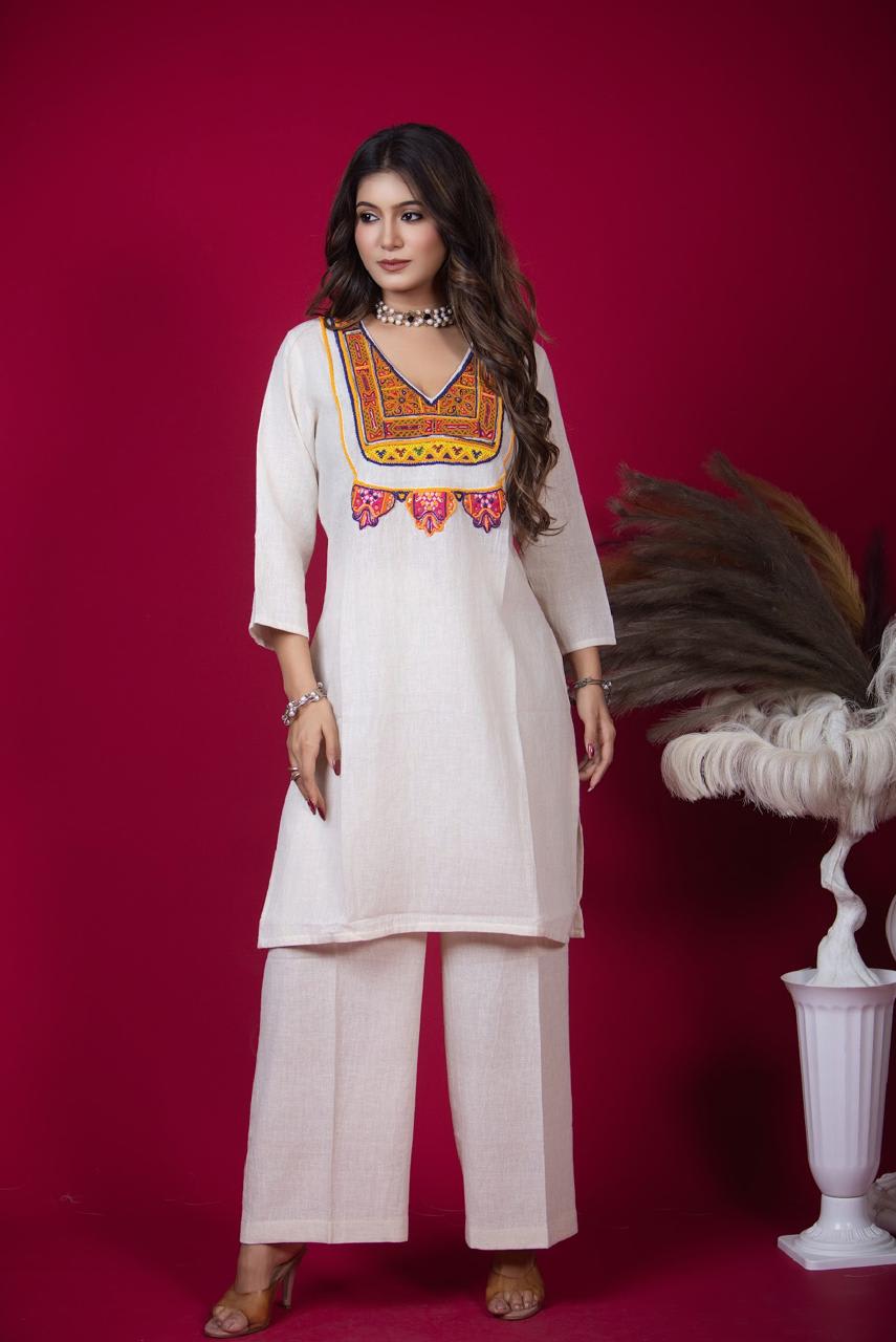 White Embroidered Kurta Set with Kutchi Patchwork and Bead Detailing