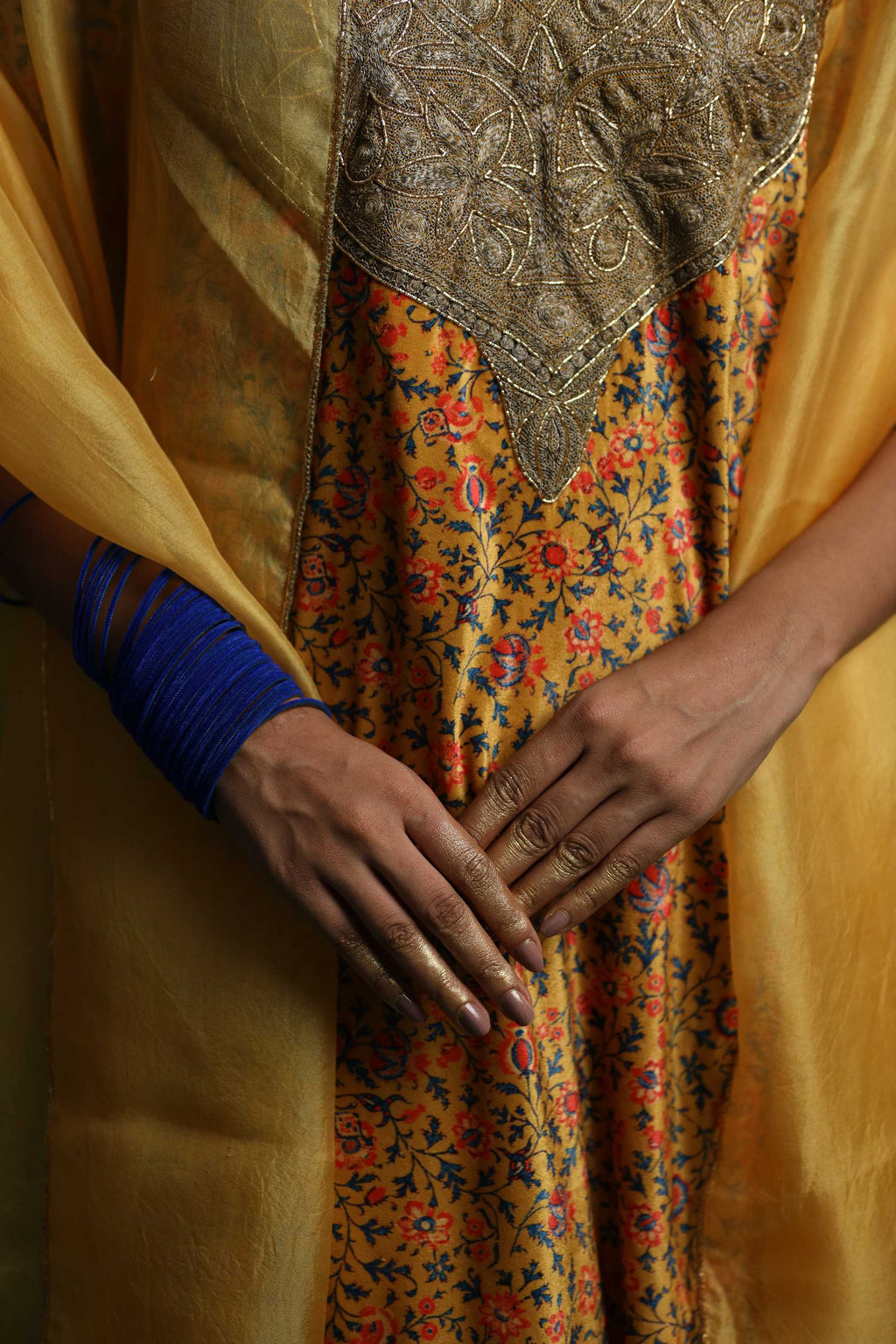 Yellow Kurti Set with Intricate Floral Embroidery and Flowing Fabric