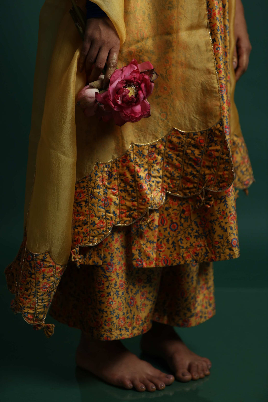 Yellow Kurti Set with Intricate Floral Embroidery and Flowing Fabric