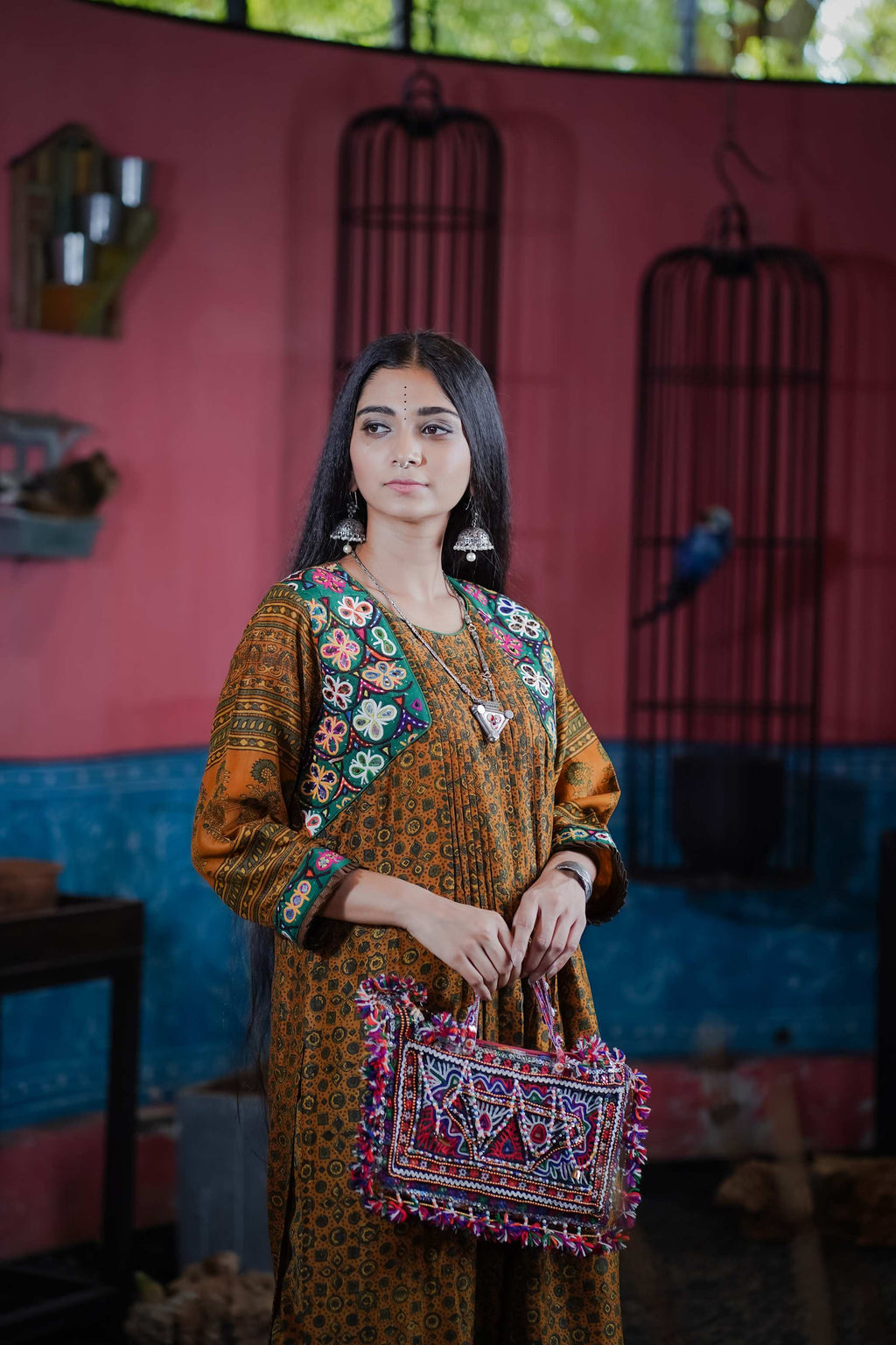 Rust Ajrak Kurti Set with Embroidered Floral Yoke and Flowing Fit