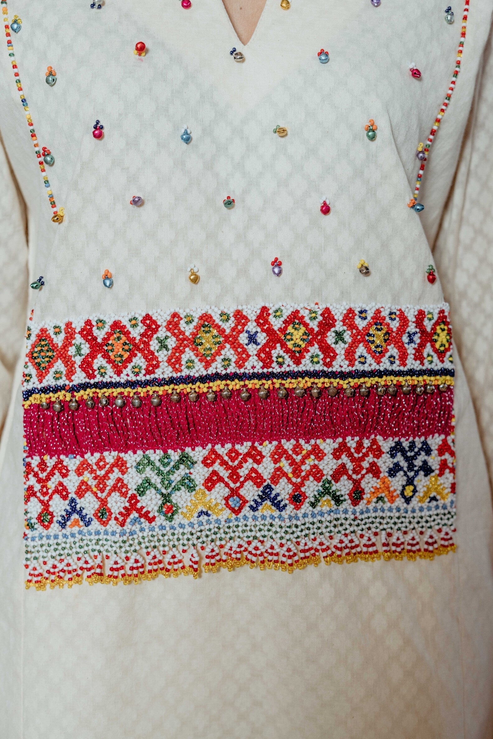 White Kurti Set with Pink Beadwork and Geometric Motifs