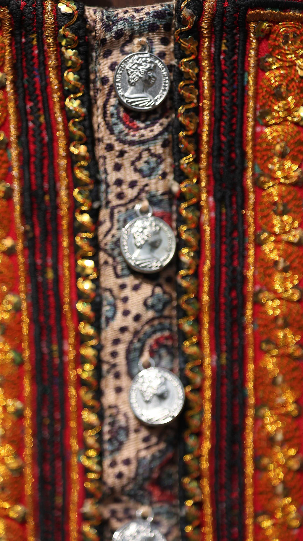 Traditional Red Kurti Set with Intricate Gold Embroidery and Bold Patterning