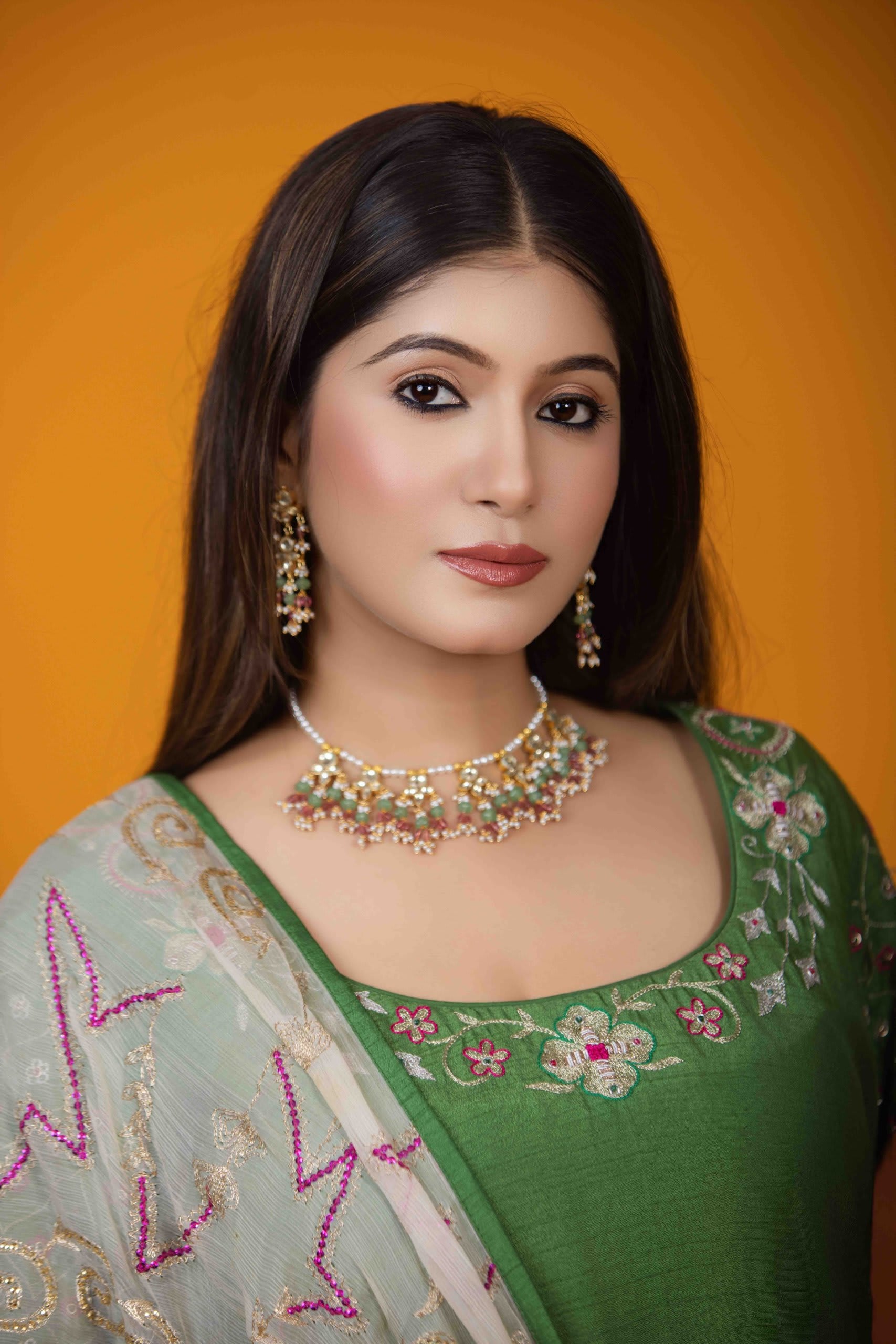 Green A-Line Kurta Set with Hand Embroidery & Floral Motifs