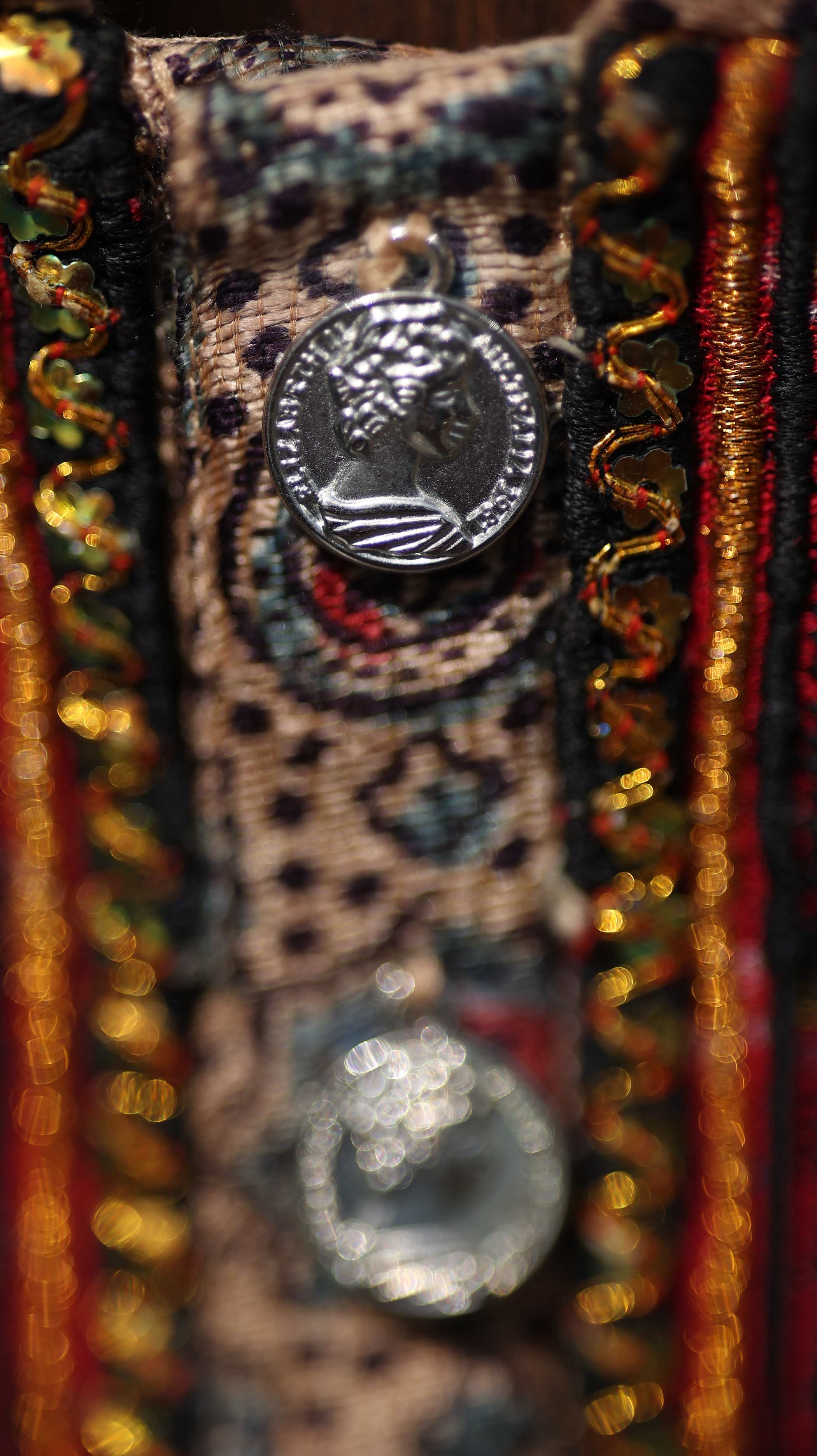 Traditional Red Kurti Set with Intricate Gold Embroidery and Bold Patterning