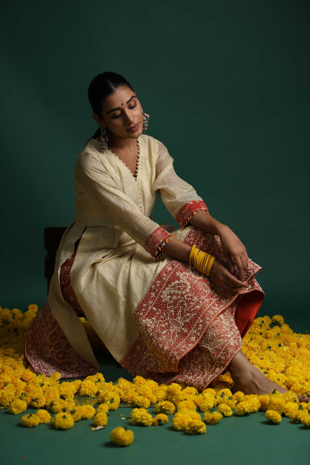 Ivory Kurti Set with Intricate Red Floral Patterns and Mirror Work