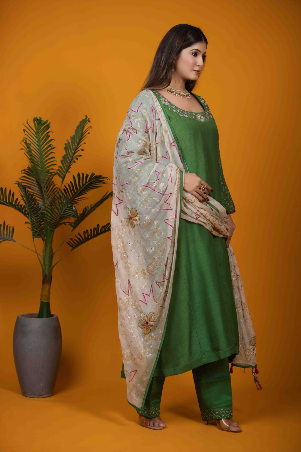 Green A-Line Kurta Set with Hand Embroidery & Floral Motifs
