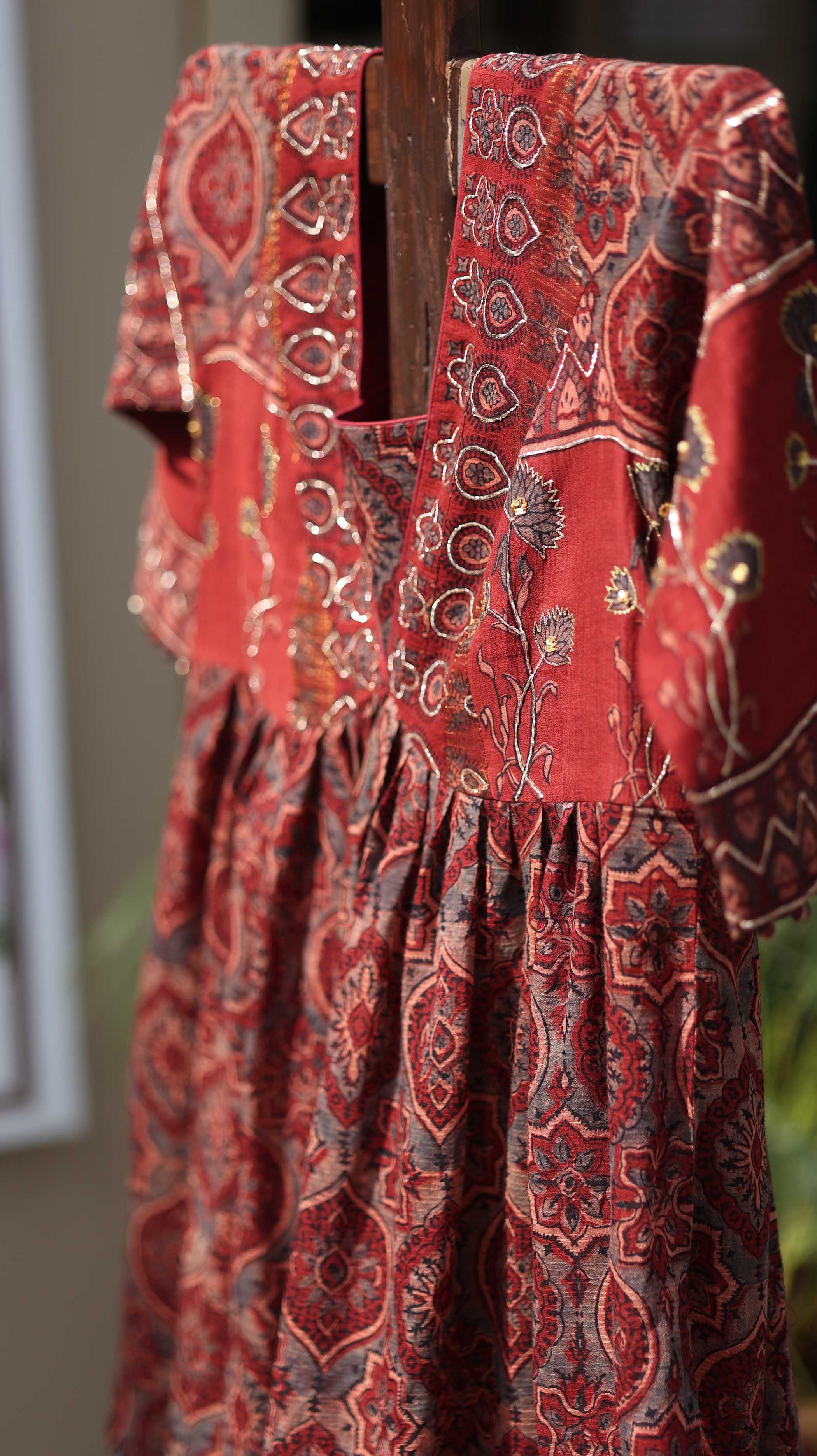 Rust Parampara Kurti Set with Mirror Work & Flowing Skirt