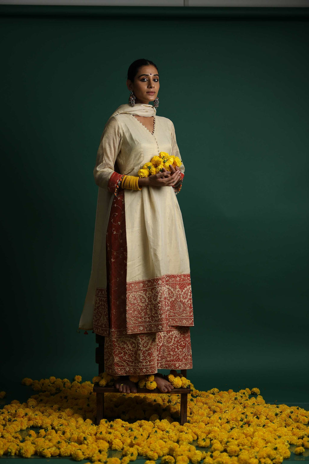 Ivory Kurti Set with Intricate Red Floral Patterns and Mirror Work