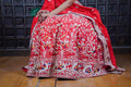 Red Ajrak Lehenga with Hand-Embroidered Peacock Motifs