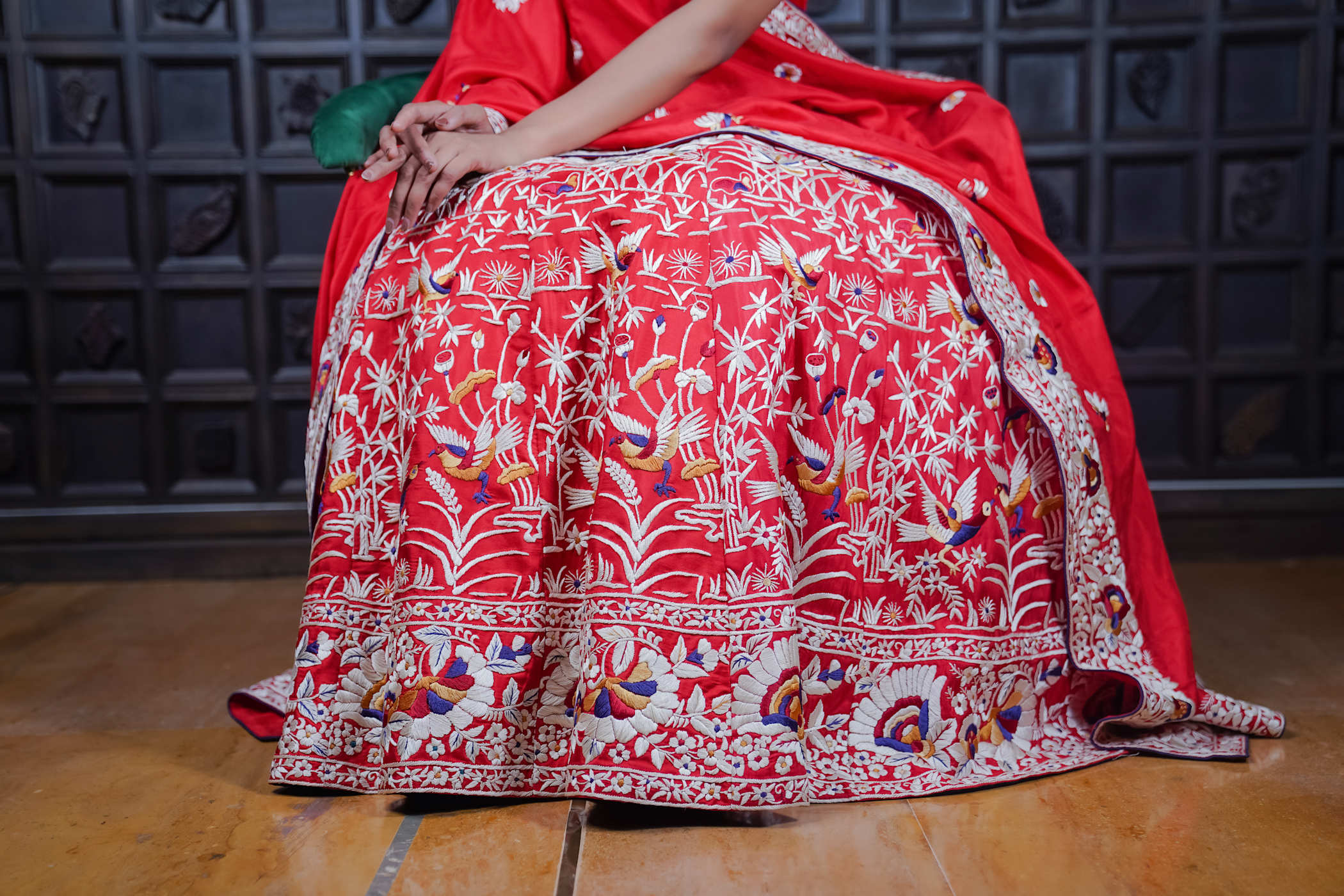 Red Ajrak Lehenga with Hand-Embroidered Peacock Motifs