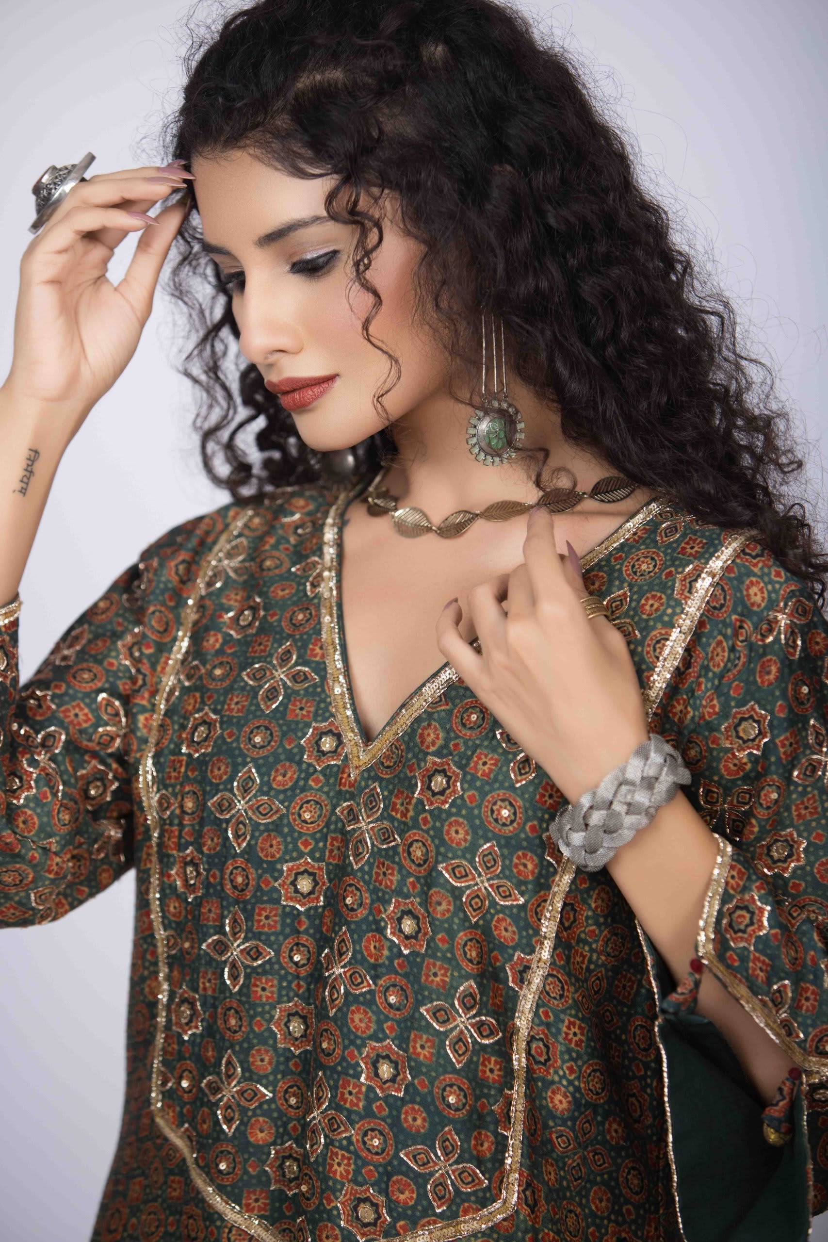 Green Ajrakh Kurta with Intricate Pita Work & Bell Sleeves