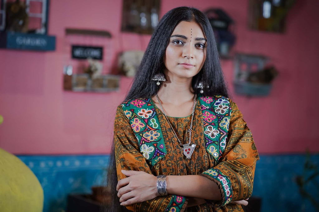 Rust Ajrak Kurti Set with Embroidered Floral Yoke and Flowing Fit